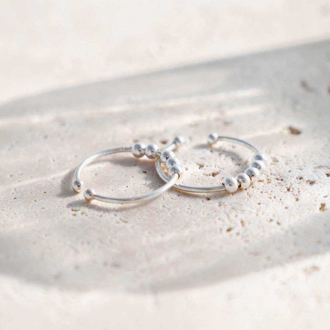 Bague Anti-Stress Ajustable - Une Réflexion